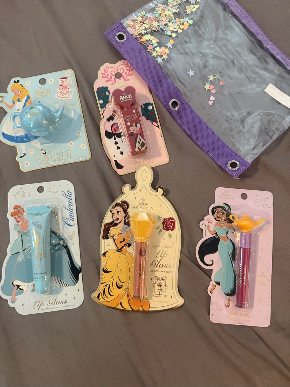 Set of 5 Disney Princess Lip Glosses and Balm with clear glitter bag
